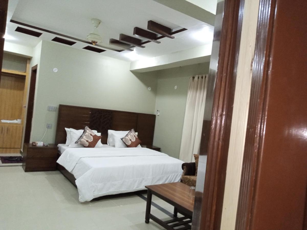 Hotel Al Markaz Исламабад Екстериор снимка